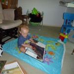 Xander reading on his own