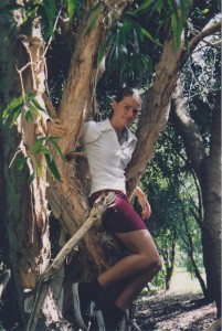 Me up a tree in my school uniform, because that was 50% of my school life.
