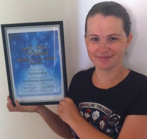 Me and my shiny new certificate. Yes, I framed it.